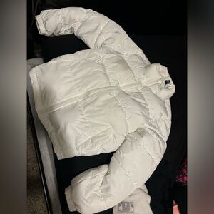 White puffer coat.